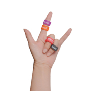 Four personalised creative rubber rings make a rock gesture.