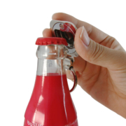 Open the bottle with Square Bottle Opener Keychain With Epoxy Sticker